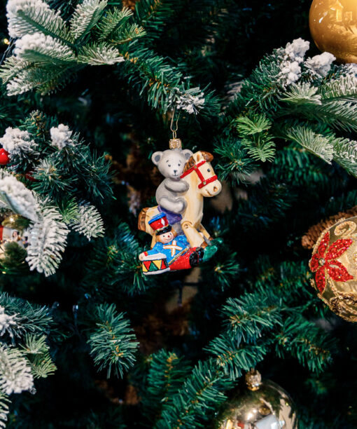 Brave teddy bear on a hobbyhorse  1k0a7931