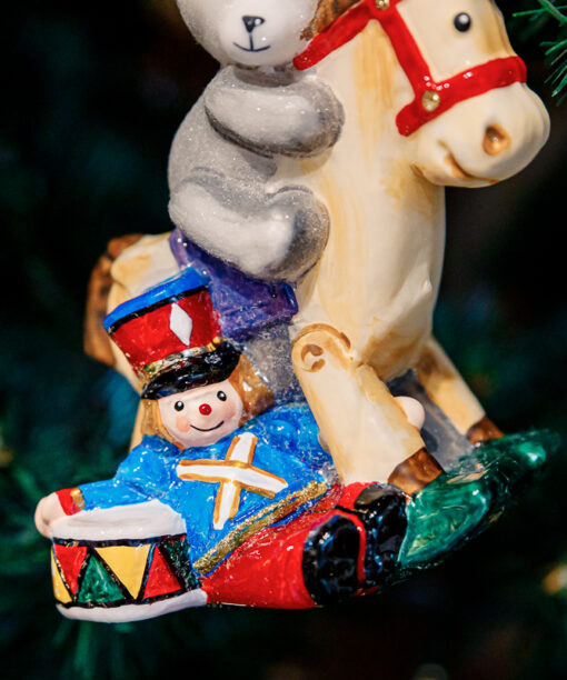 Brave teddy bear on a hobbyhorse  1k0a7933