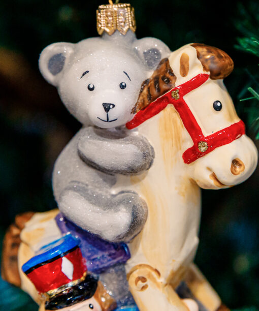Brave teddy bear on a hobbyhorse  1k0a7934