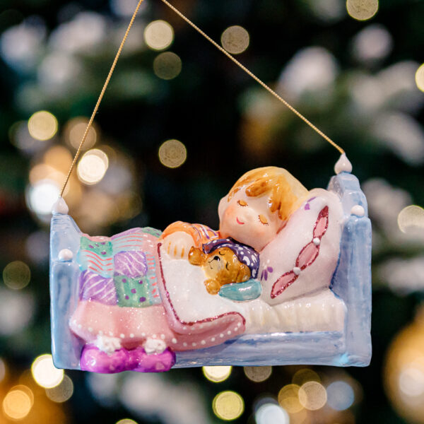 Baby girl in a crib 1k0a9011