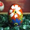 Wooden Easter egg - Flowers on orange Mg 6362 scaled