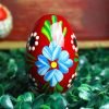 Wooden Easter egg - Blue flower on red Mg 6368 scaled