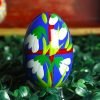 Wooden Easter egg - Lily of the valley on red Mg 6394 scaled